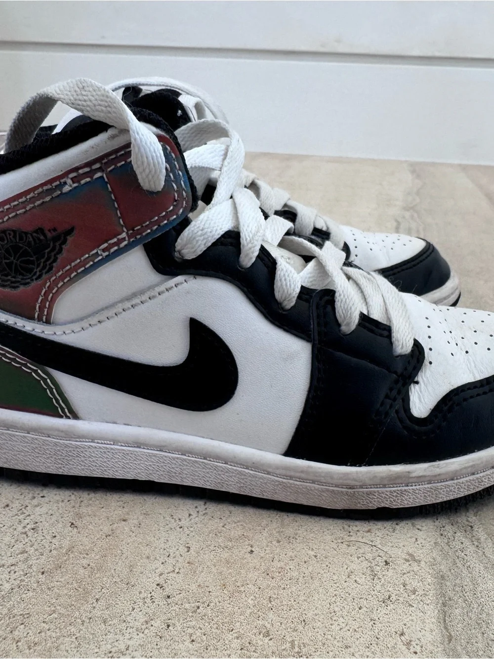 Air Jordan 1 mid. Black and white with Reflective iridescent heel panel. Size 13